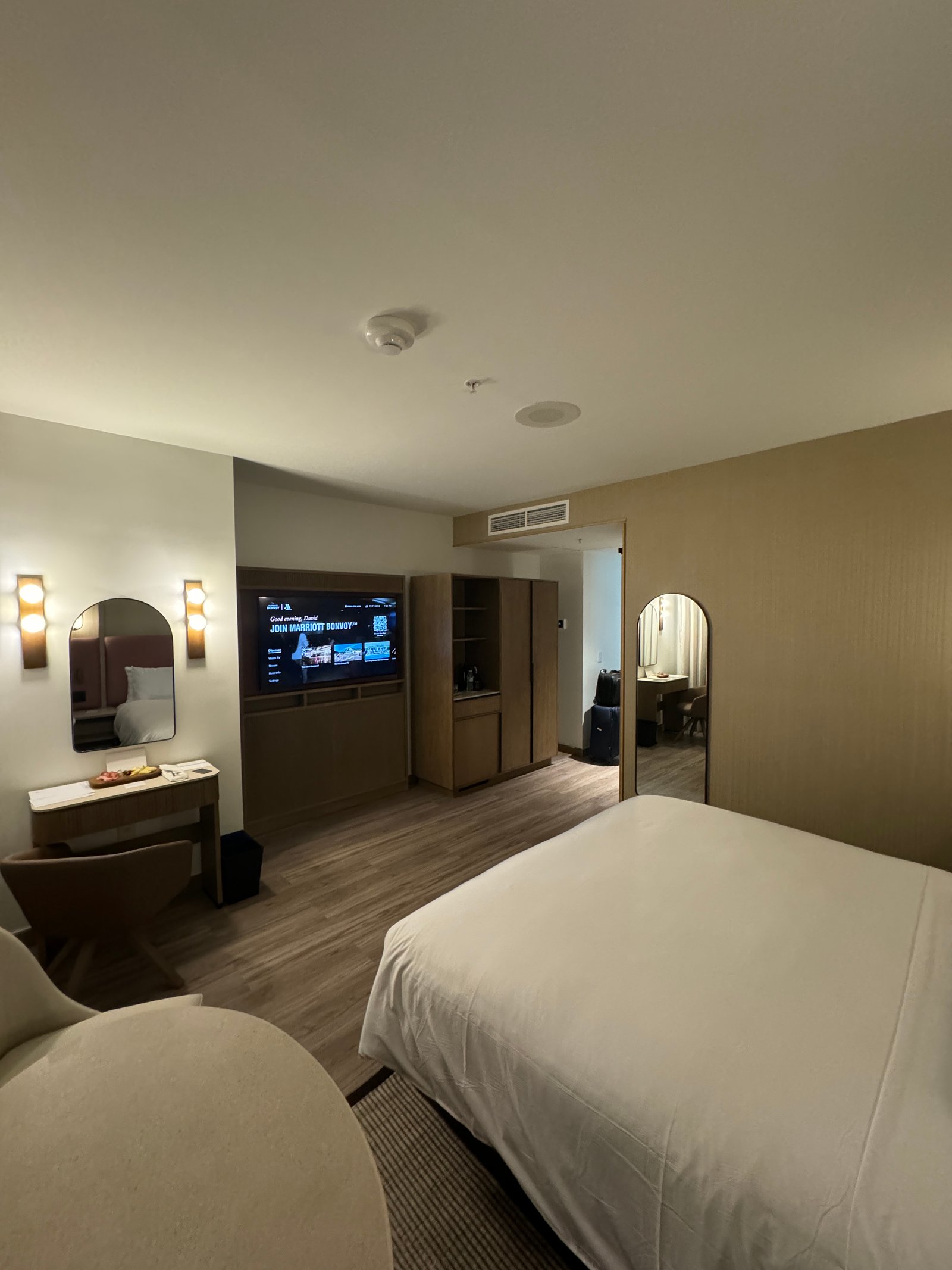 Courtyard Santo Domingo Piantini king bed modern room interior, Dominican Republic