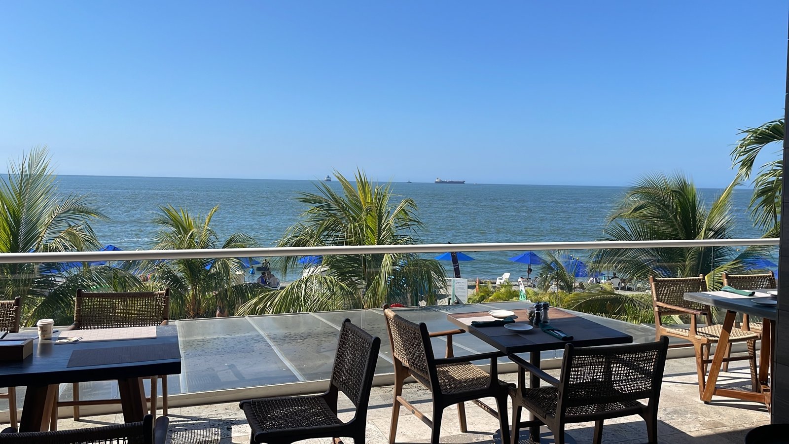 Marriott Santa Marta Resort beach bar with tropical garden and Caribbean ocean view, Colombia