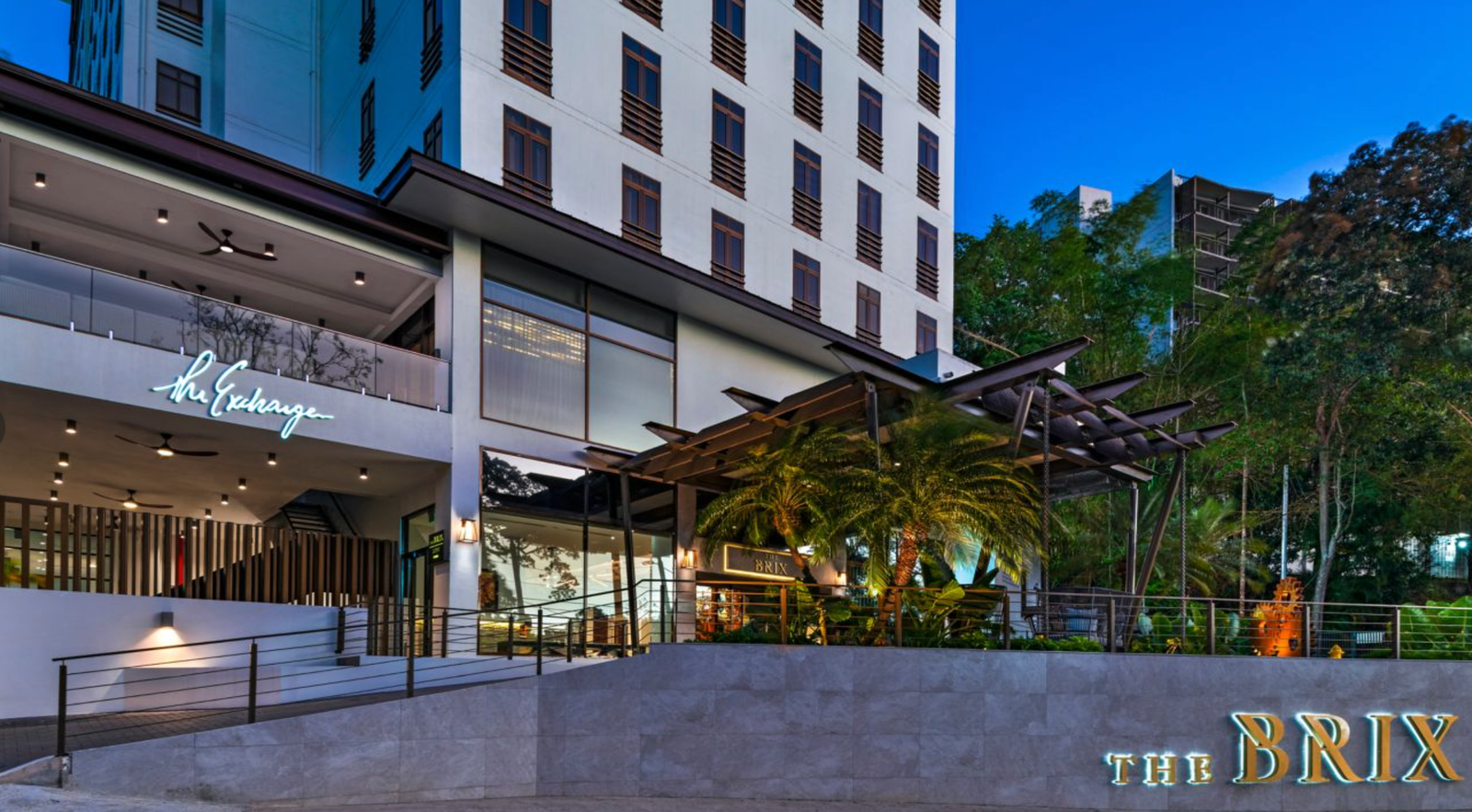 The Brix Autograph Collection hotel exterior entrance at night, Port of Spain Trinidad
