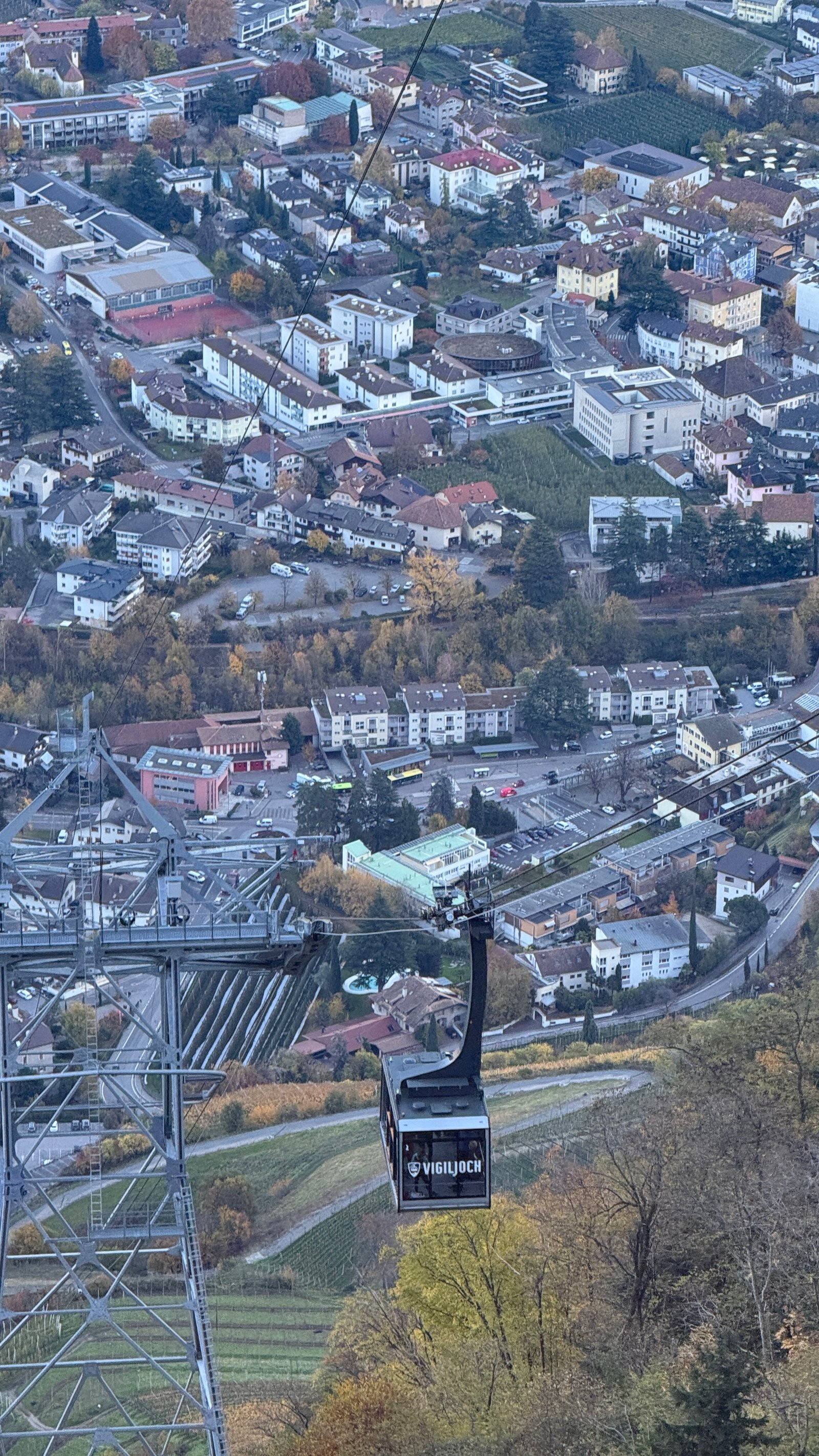 Vigiljoch gondola descending above Lana town, South Tyrol Italy